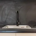Sr