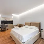 Sr