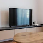 Sr